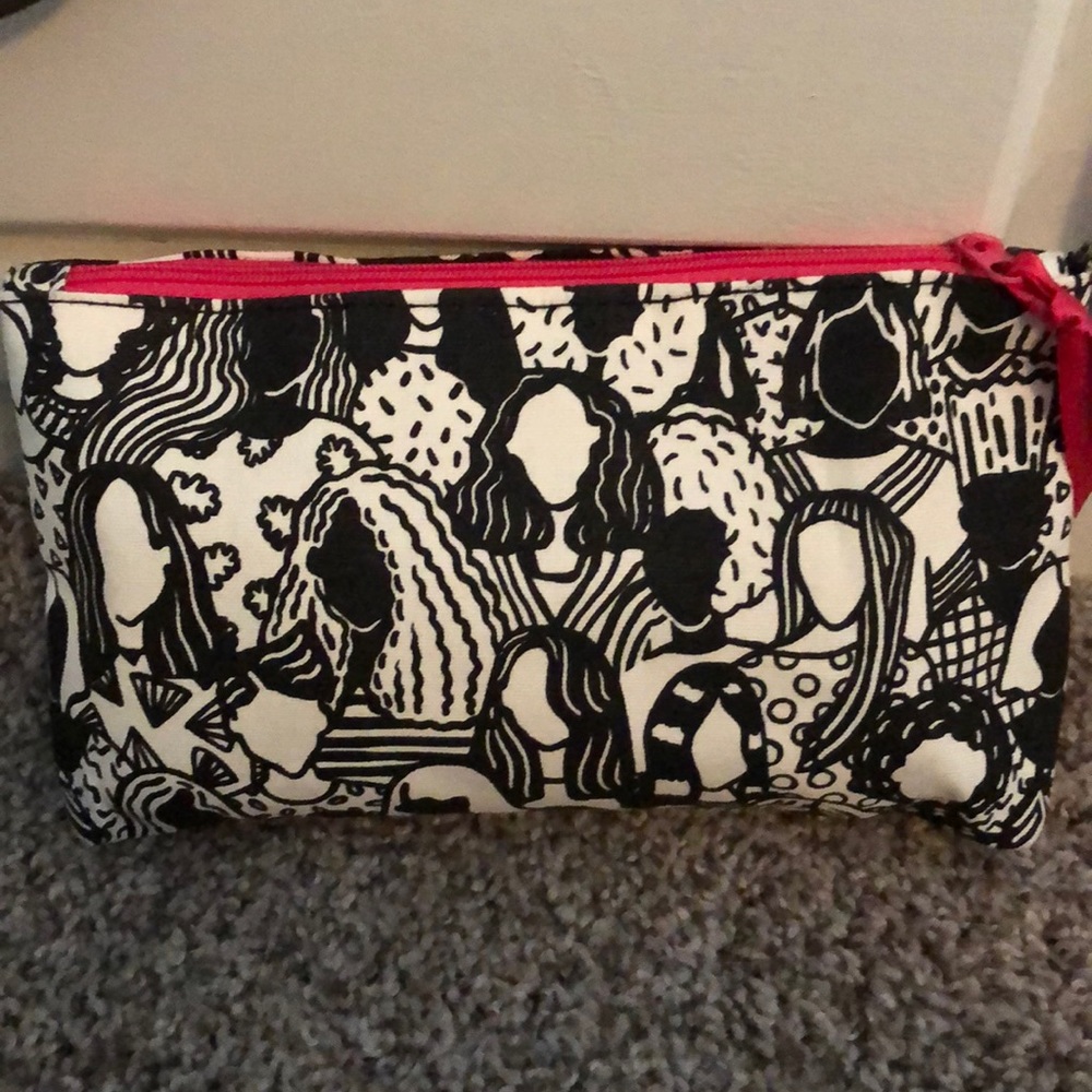 Makeup bag with makeup and brushes